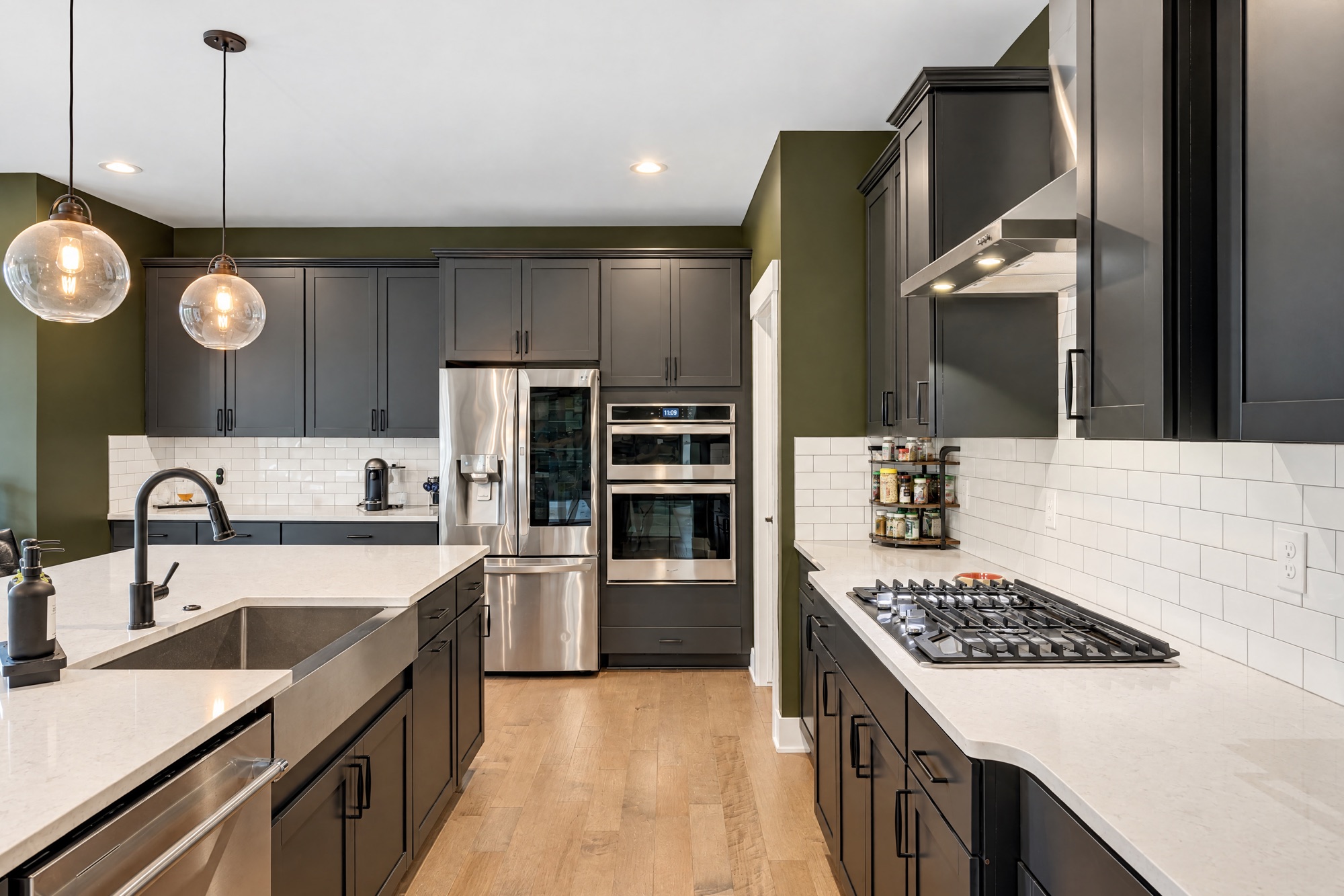 The same kitchen after HDR blending, with the room and the window both correctly exposed