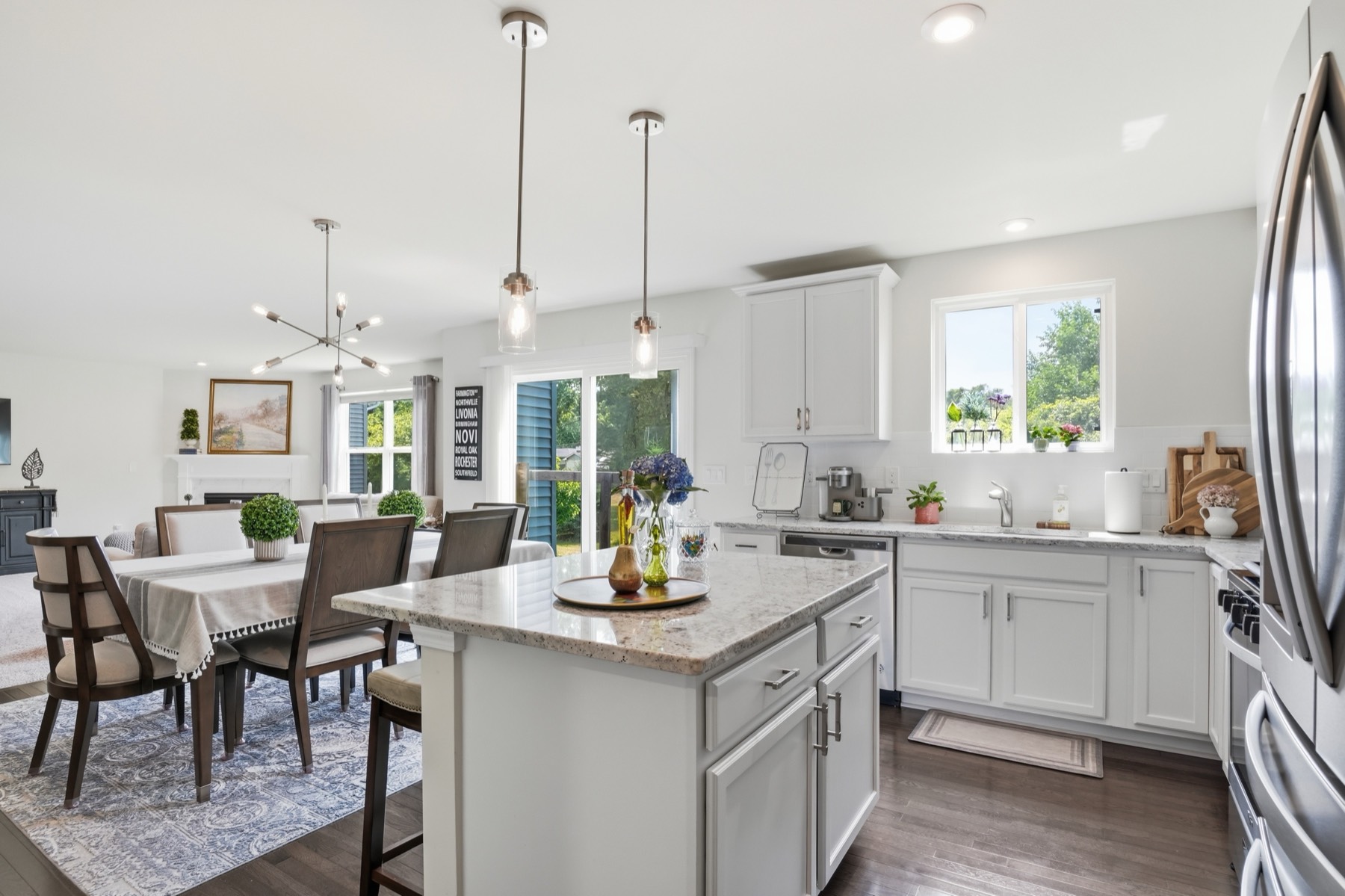 Bright open-plan kitchen and dining room photographed for a Metro Detroit listing