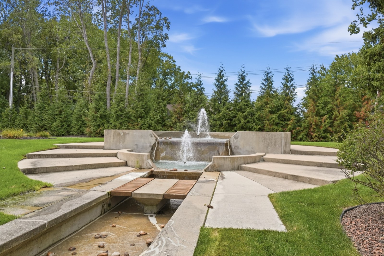 Courtyard fountain at a Metro Detroit listing, photographed for same day delivery