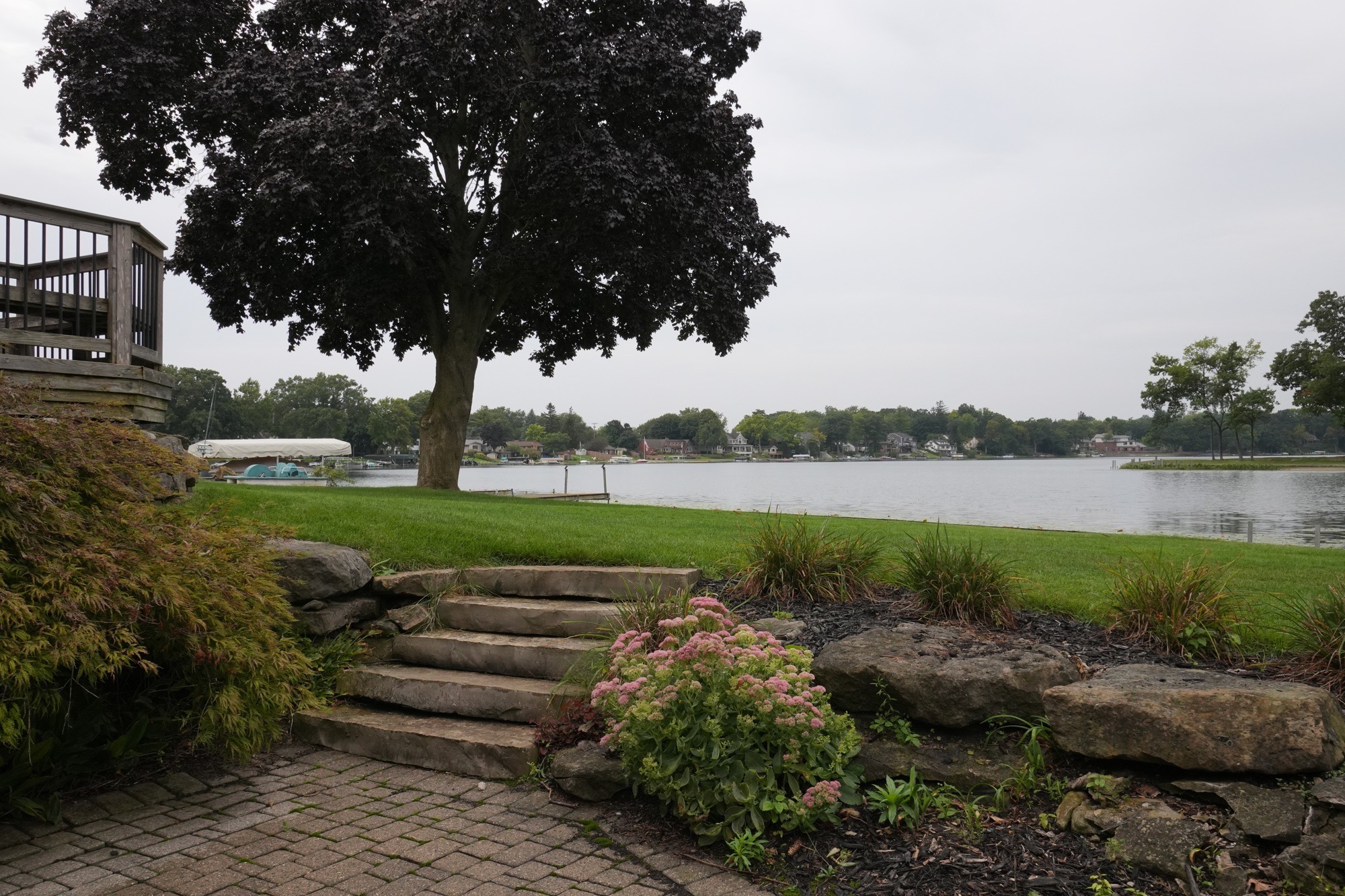 Waterfront exterior photographed under a flat, overcast sky