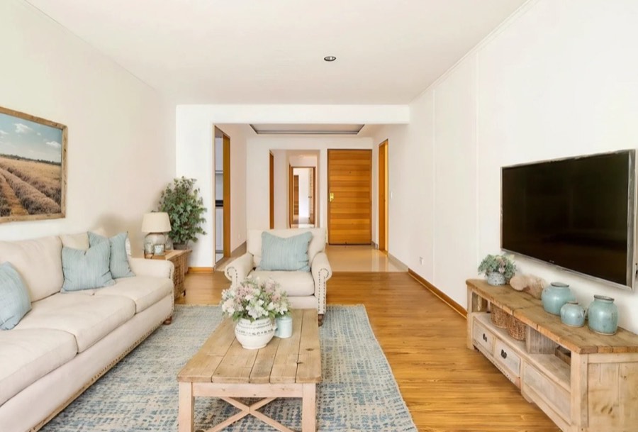 A living room virtually staged in a farmhouse style