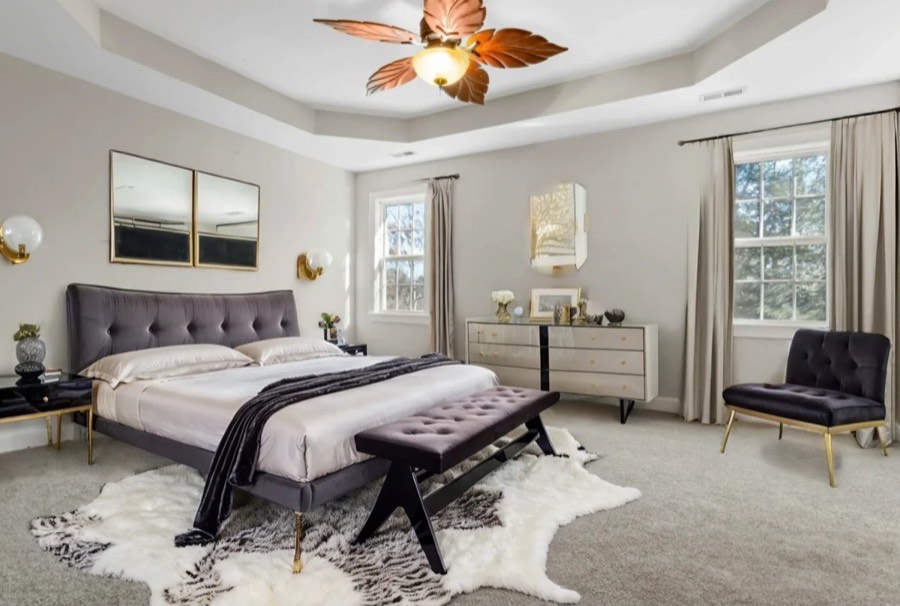 A bedroom virtually staged in a luxury style