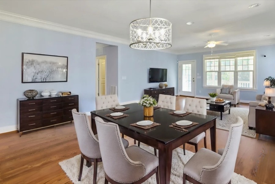 A dining room virtually staged in a luxury style