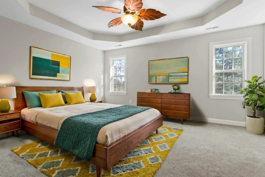 A bedroom virtually staged in a mid-century style