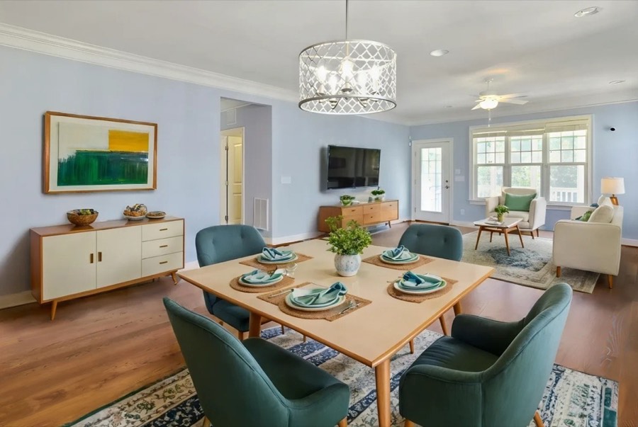 A dining room virtually staged in a mid-century style