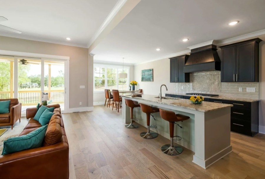 A kitchen virtually staged in a mid-century style