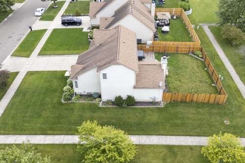 side of house neighborhood drone