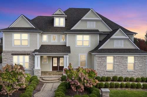 Drone hero image of the front of a house