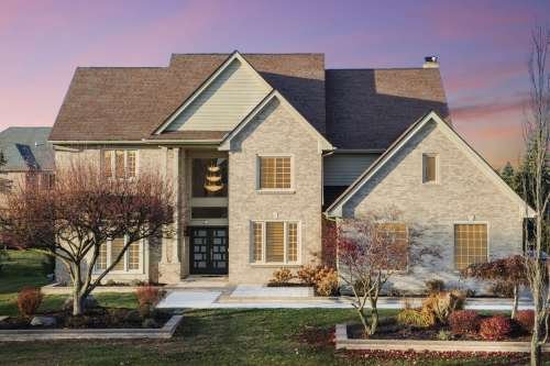 Drone hero image of a colonial home